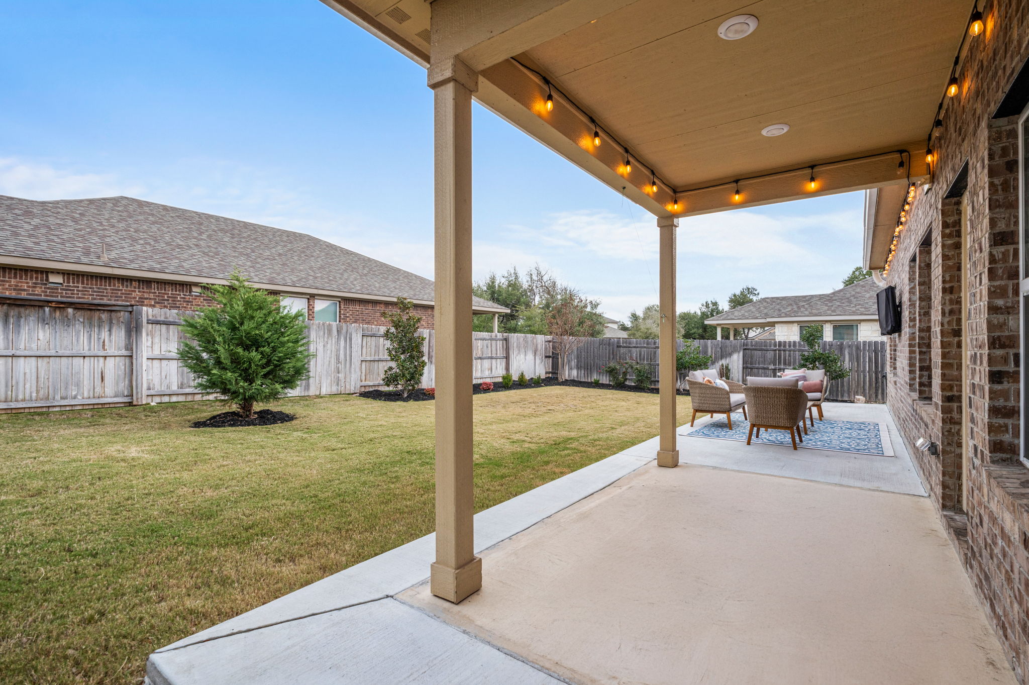 1509 Deering Run Leander, TX 78641 - Photo 33 of 38 Extended rear patio designed for outdoor dining and entertaining