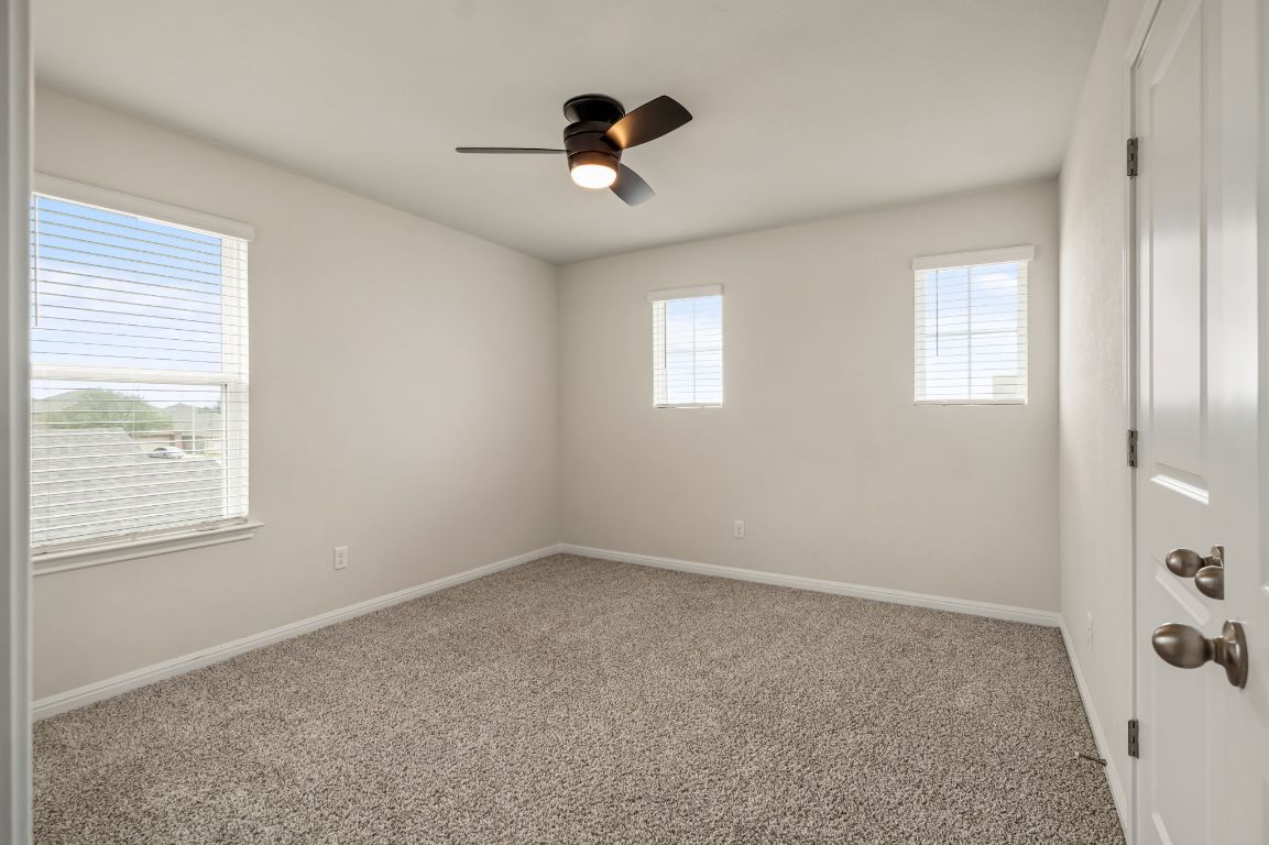 1509 Deering Run Leander, TX 78641 - Photo 34 of 37 a view of an empty room with a window