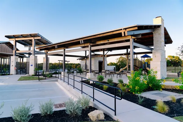 a view of swimming pool with outdoor seating