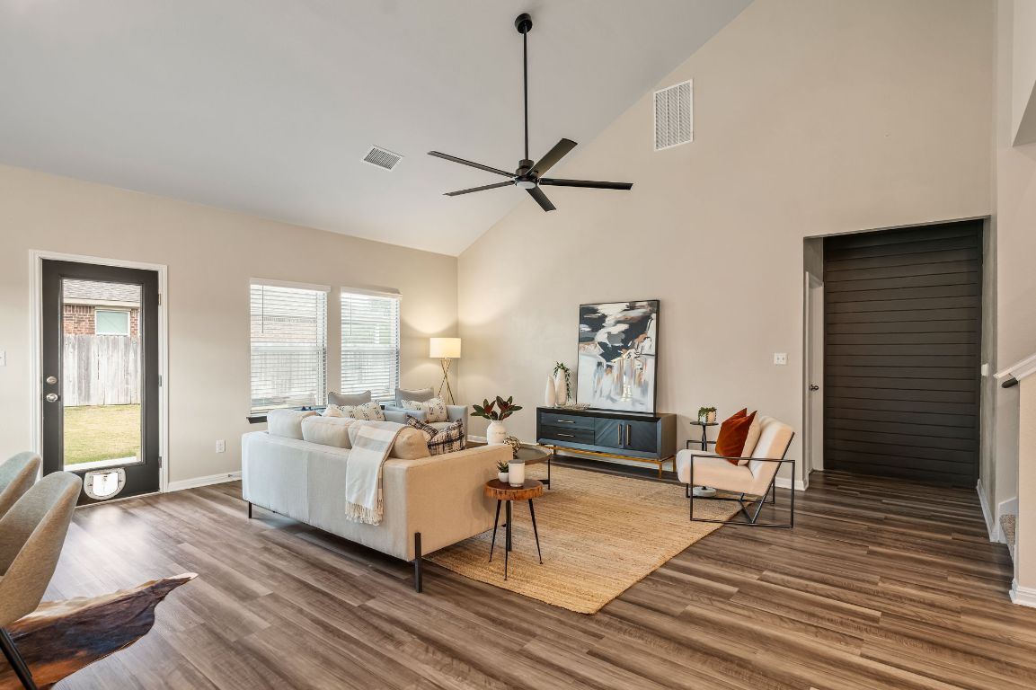 1509 Deering Run Leander, TX 78641 - Photo 5 of 37 a living room with furniture and a wooden floor