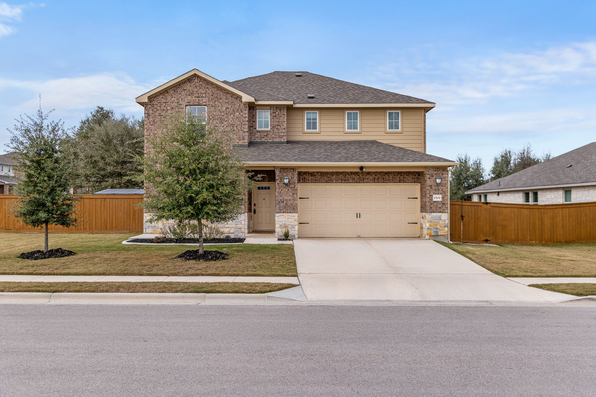 1509 Deering Run Leander, TX 78641 - Photo 7 of 38 Striking exterior set on a large corner lot in Deerbrooke