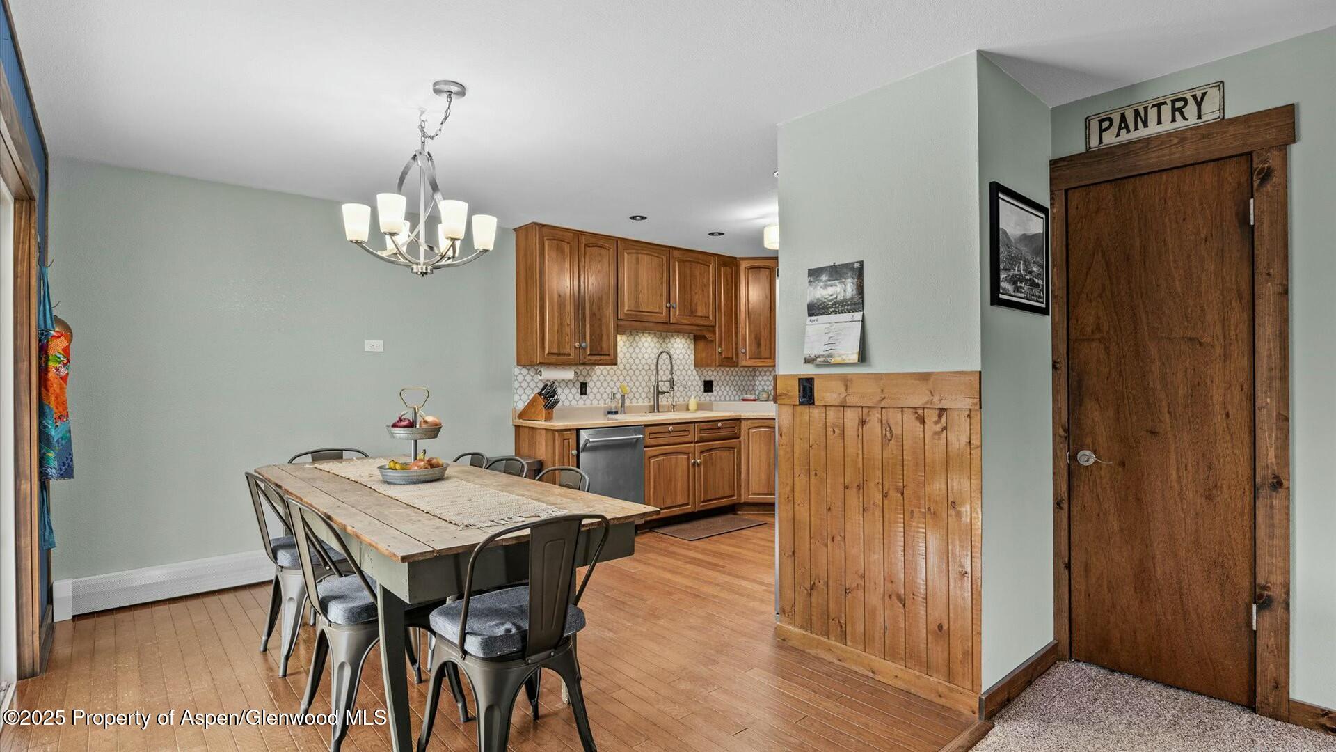 1201 Fir Avenue Rifle, CO 81650 - Photo 13 of 25 a view of kitchen and dining area with furniture