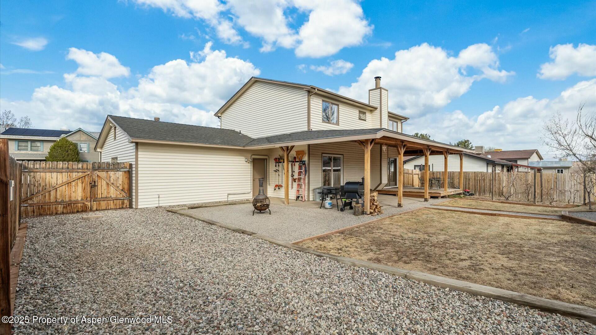 1201 Fir Avenue Rifle, CO 81650 - Photo 24 of 25 a view of a house with backyard