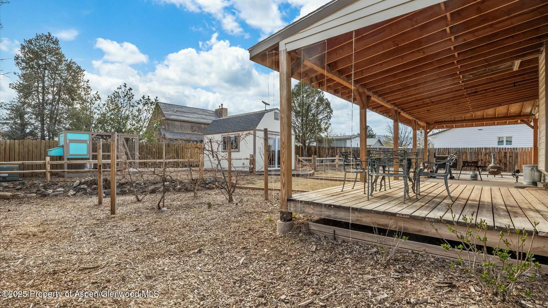 1201 Fir Avenue Rifle, CO 81650 - Photo 25 of 25 a view of a backyard with sitting area