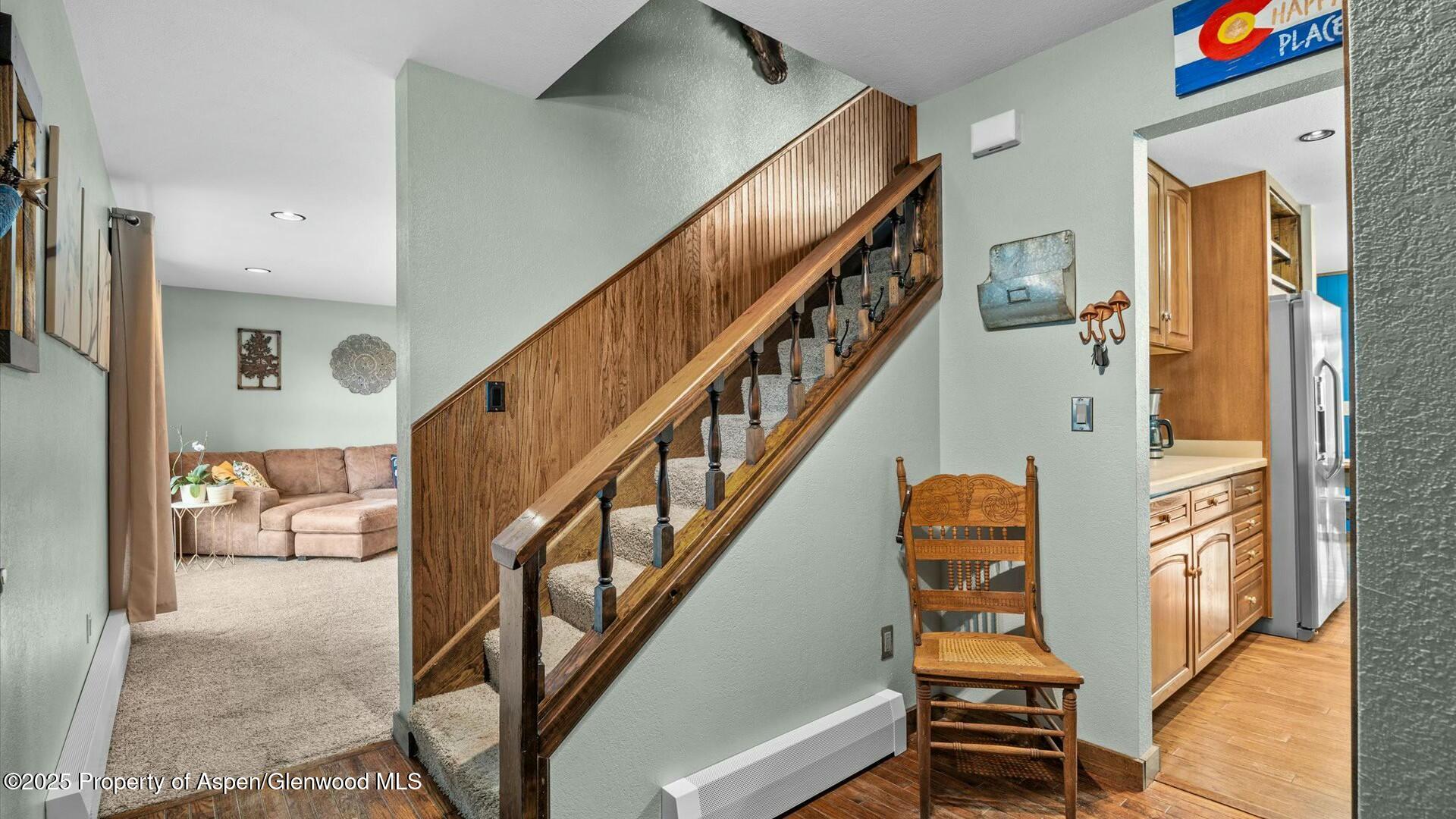 1201 Fir Avenue Rifle, CO 81650 - Photo 5 of 25 a view of entryway and hall with wooden floor