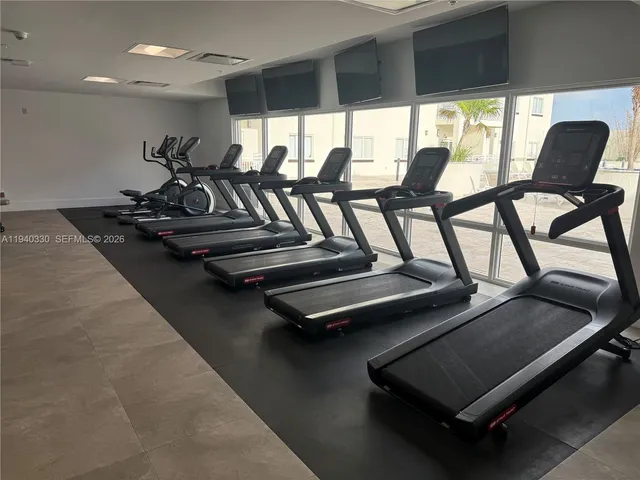 a view of a room with gym equipment