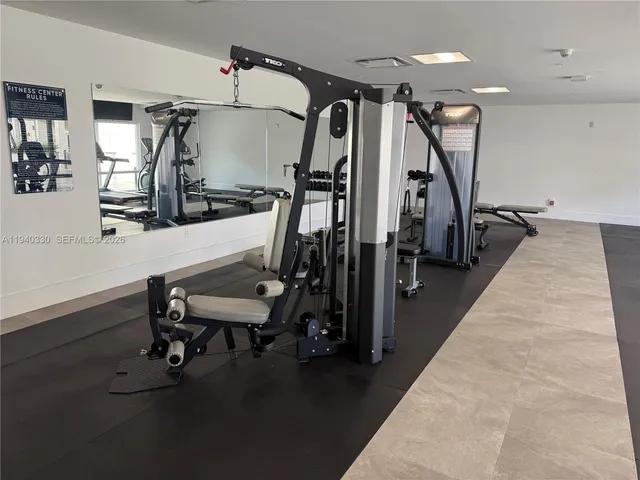 a view of a room with gym equipment