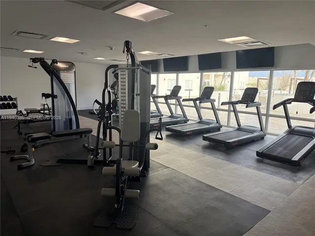 a view of a room with gym equipment