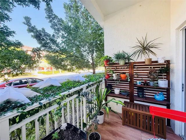 a view of street from balcony