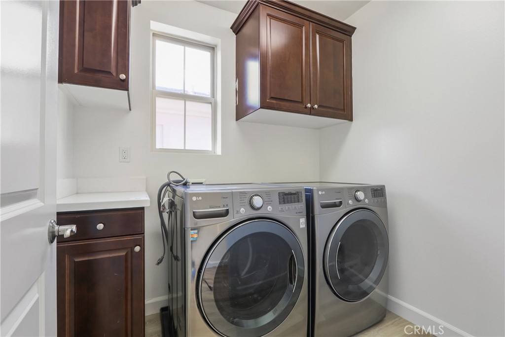 123 Windham Irvine, CA 92620 - Photo 12 of 20 a utility room with dryer and washer