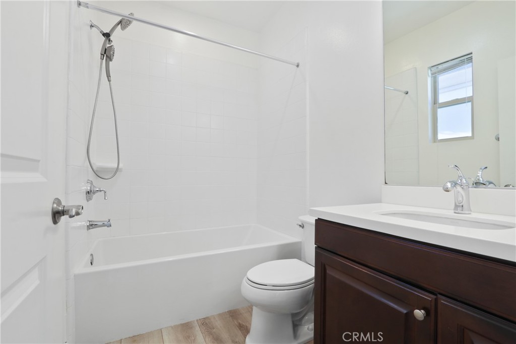 123 Windham Irvine, CA 92620 - Photo 16 of 20 a bathroom with a sink a toilet and shower