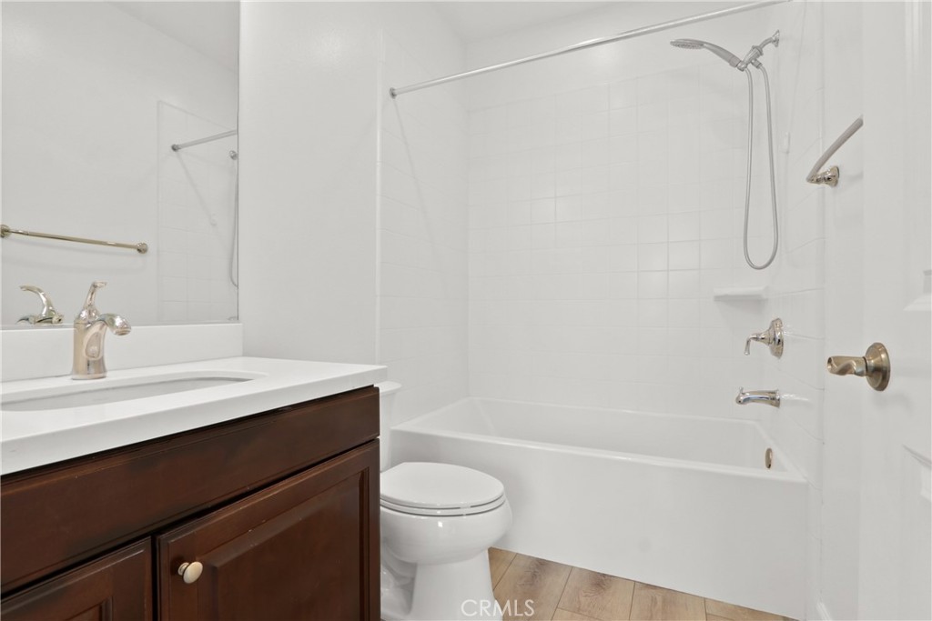 123 Windham Irvine, CA 92620 - Photo 18 of 20 a bathroom with a sink a toilet and shower