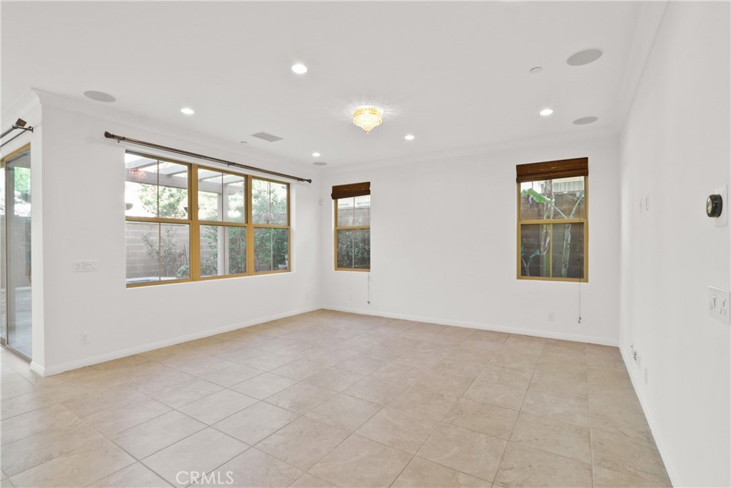 123 Windham Irvine, CA 92620 - Photo 7 of 20 an empty room with windows