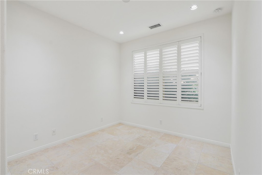 123 Windham Irvine, CA 92620 - Photo 9 of 20 an empty room with a window