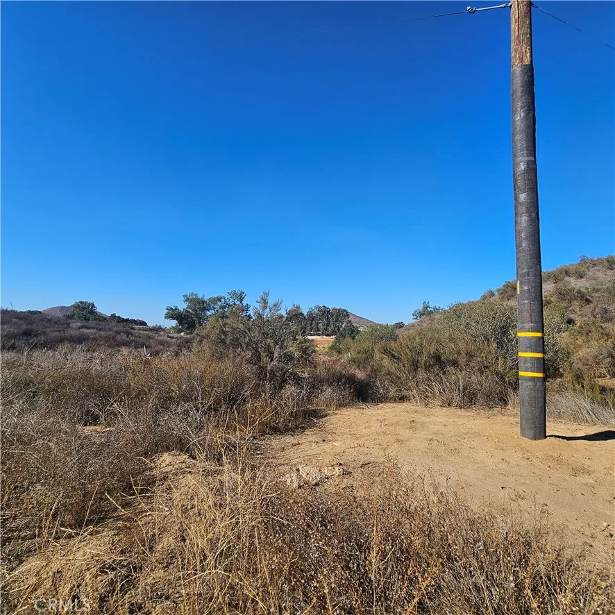 0 Locust Street Menifee, CA 92584 - Photo 2 of 11 a view of a dry yard with mountain