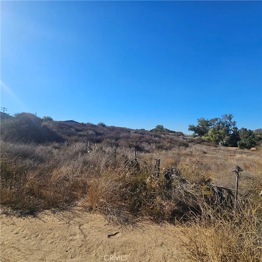 0 Locust Street Menifee, CA 92584 - Photo 4 of 11 a view of lake with mountain