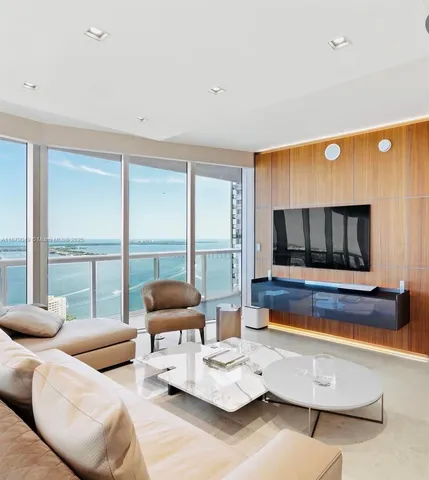 a bedroom with bed and window