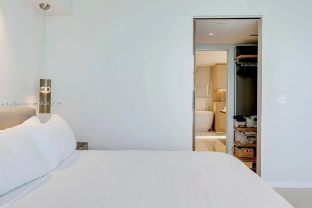 a view of a balcony with a potted plant