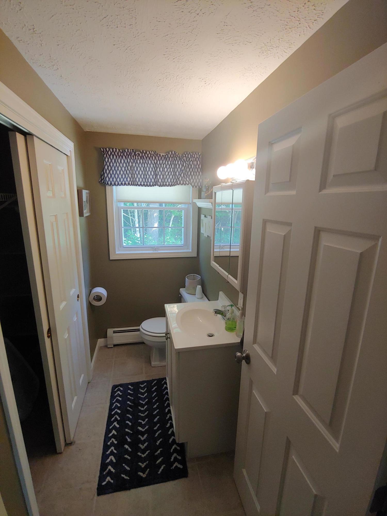 94 Lewiston Road, Unit 1 Gray, ME 04039 - Photo 7 of 15 1st floor bathroom
