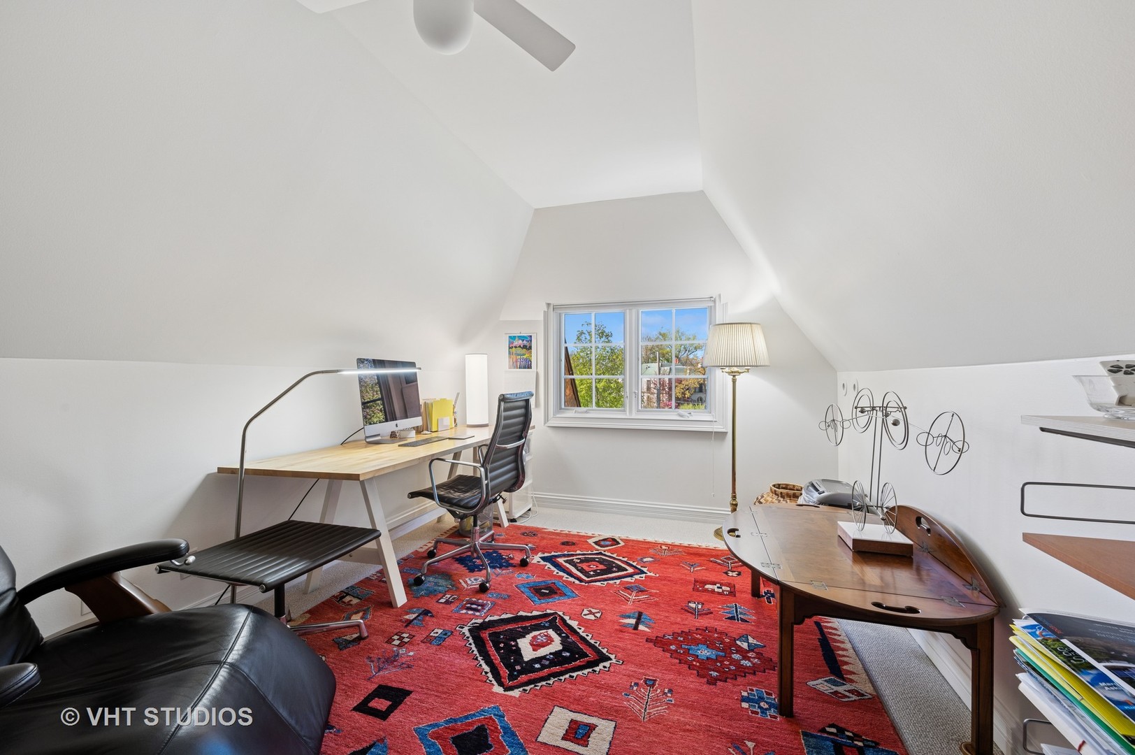 474 Sheridan Road Winnetka, IL 60093 - Photo 24 of 36 a bedroom with a bed and a table in it