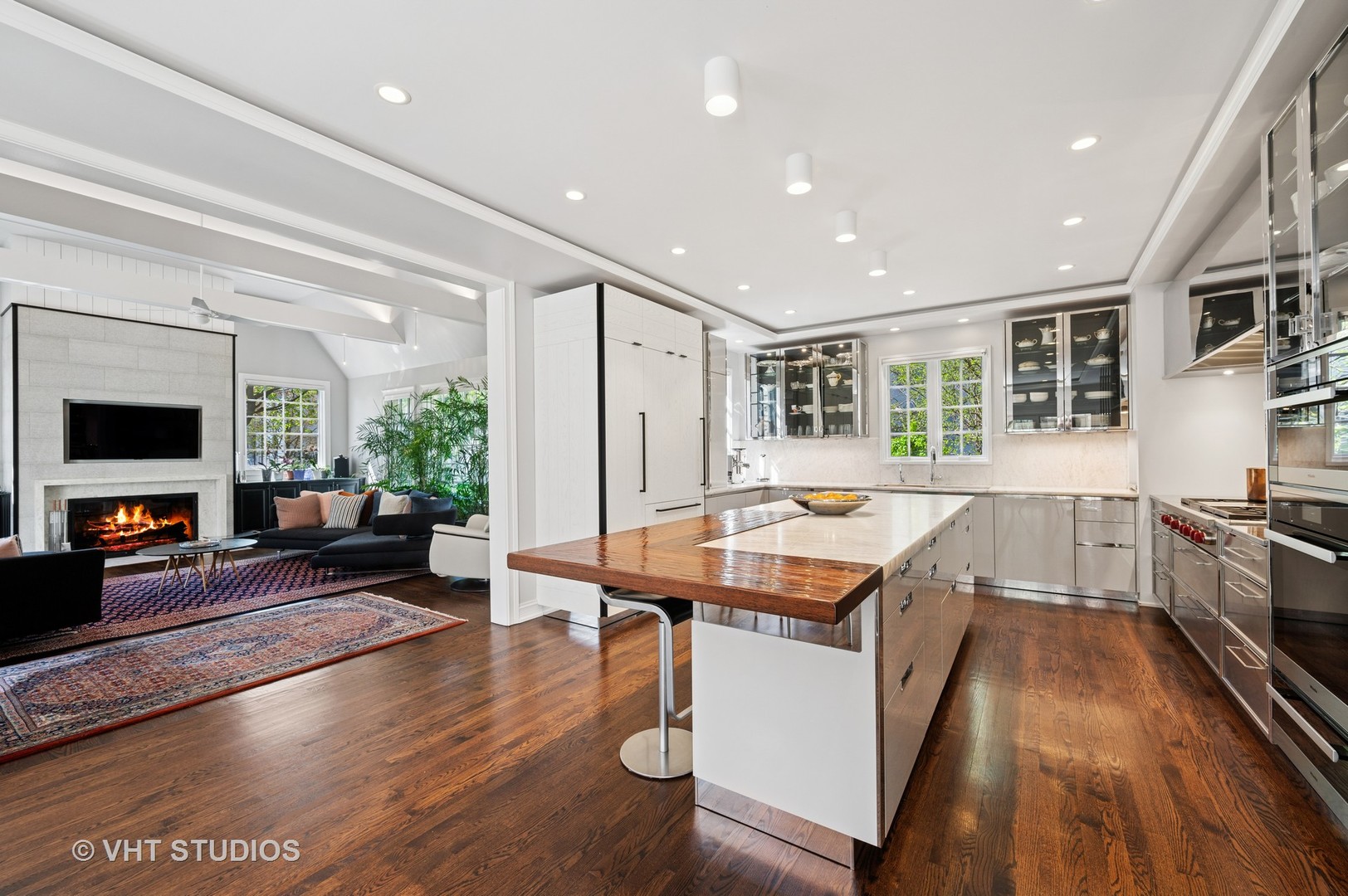 474 Sheridan Road Winnetka, IL 60093 - Photo 10 of 36 a room with lots of furniture and wooden floors