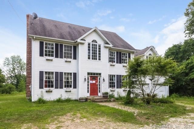35 Punkup Road Oxford, CT 06478 - Photo 1 of 1 a front view of a house with a yard and a porch