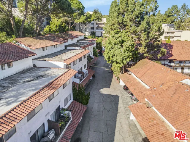 a view of a yard with an outdoor space