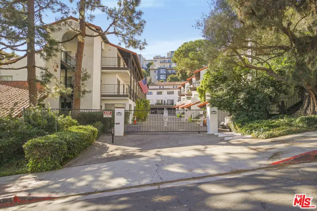 a view of a street in front of a building