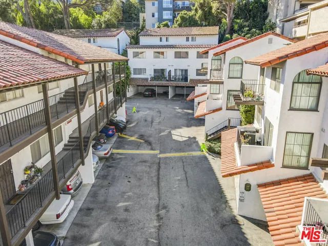 a view of a street with sitting area