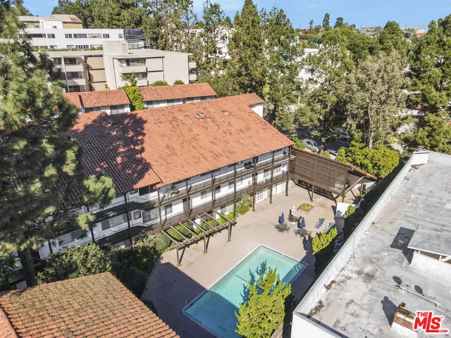 a view of a balcony with chairs