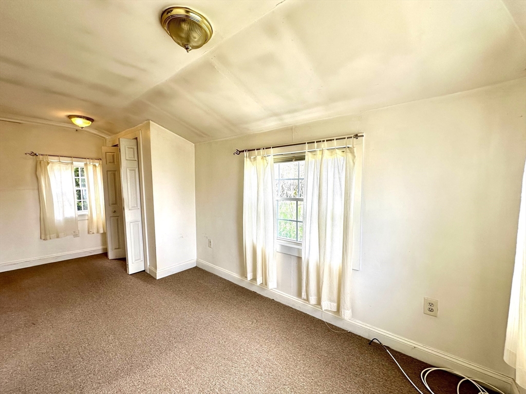 1467 State Road Plymouth, MA 02360 - Photo 28 of 31 an empty room with windows