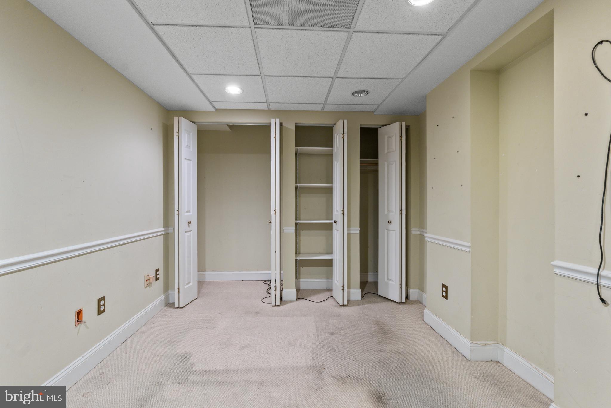 1118 St Paul Street, Unit 1 Baltimore, MD 21202 - Photo 5 of 8 an empty room with closet