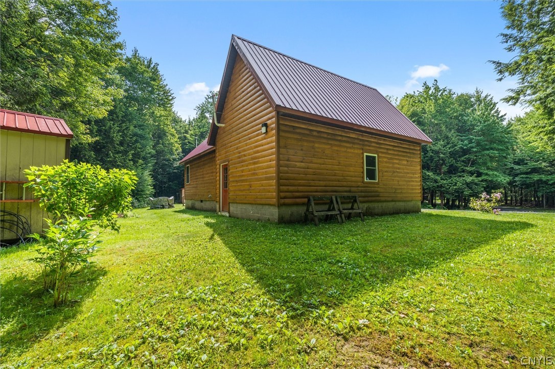 9831 Steam Mill Road Camden, NY 13316 - Photo 33 of 42 Durable metal roof provides lasting protection and