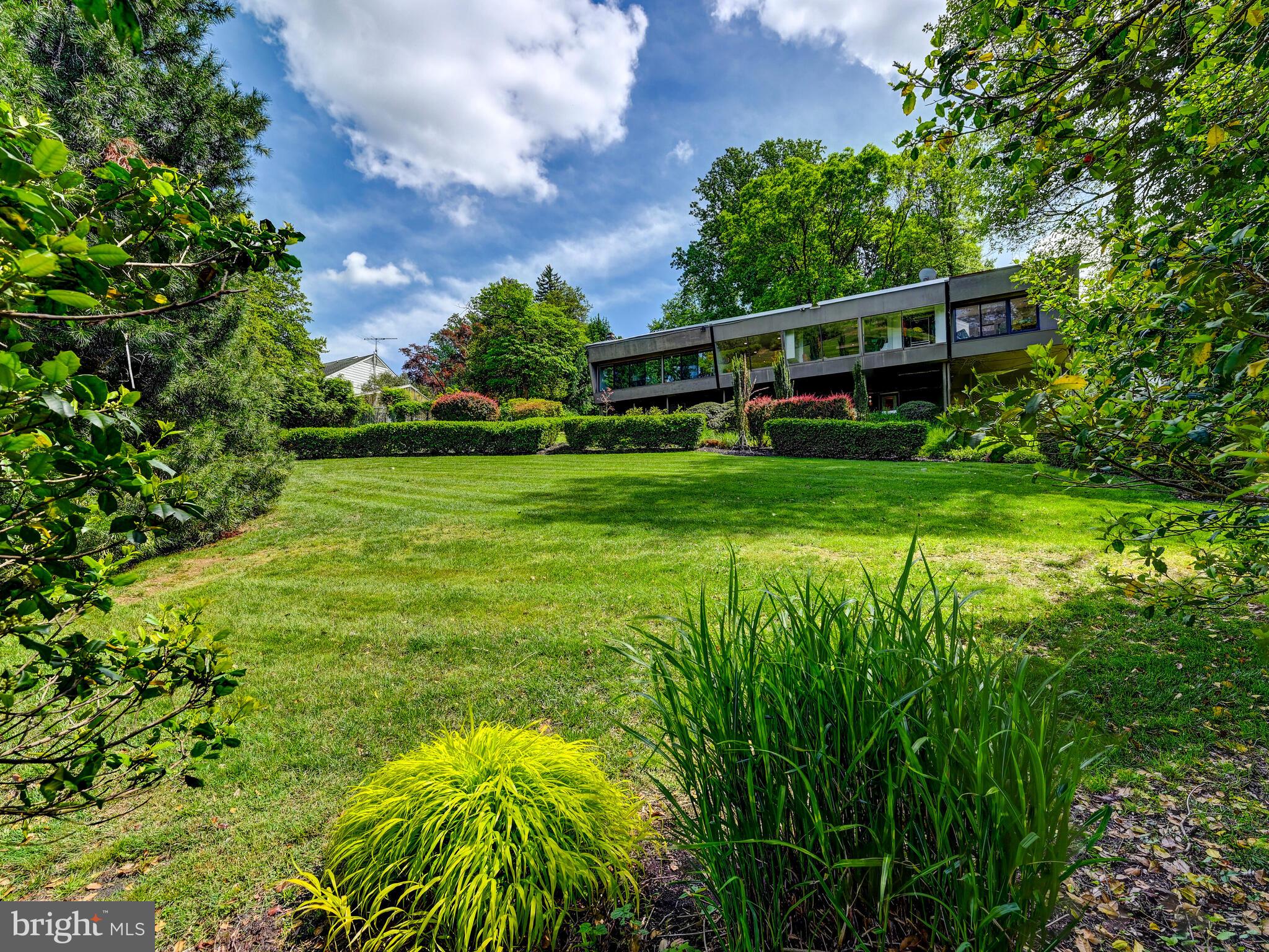 2025 Skyline Road Towson, MD 21204 - Photo 1 of 38 a backyard of a house with lots of green space and plants