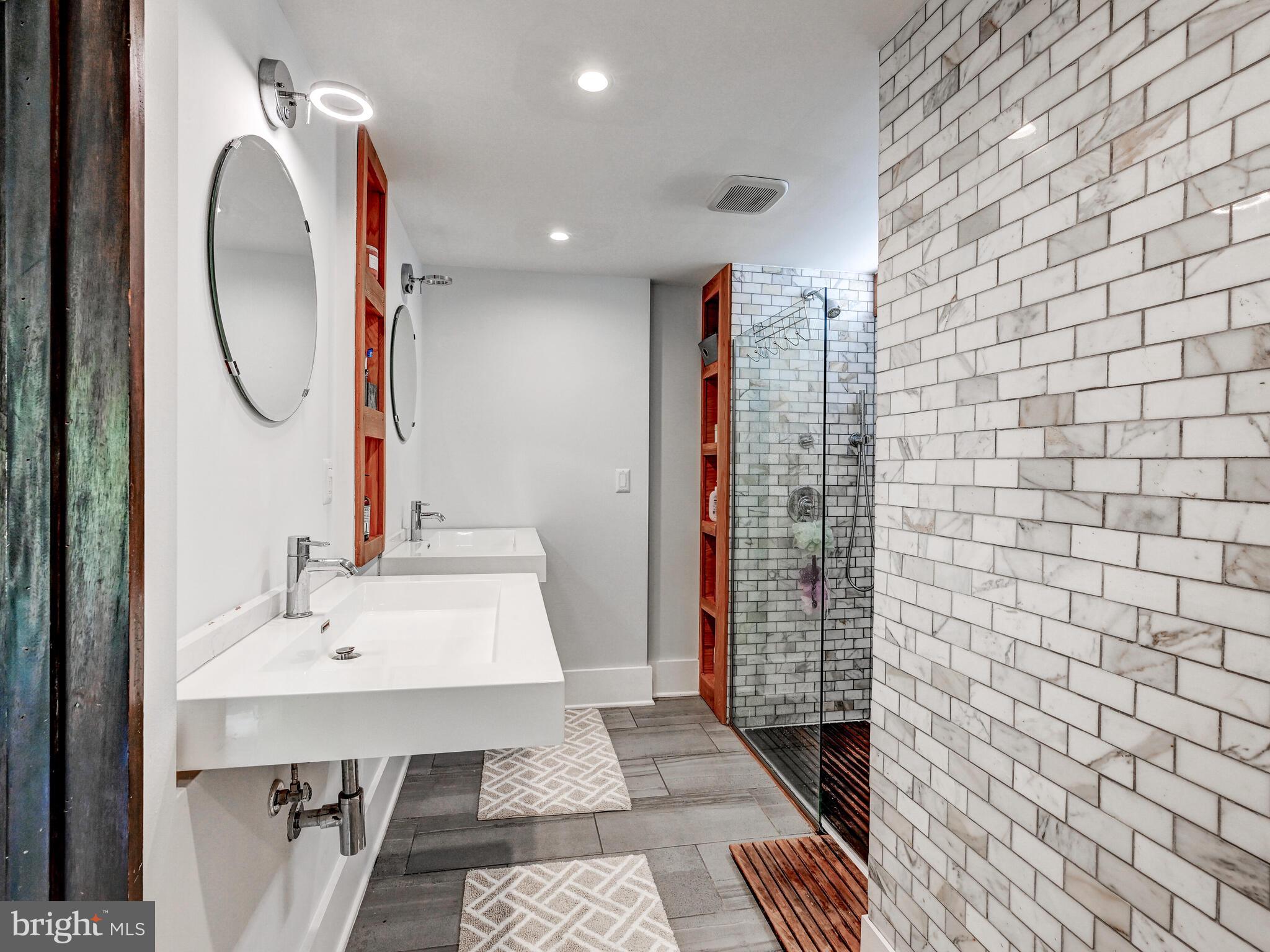 2025 Skyline Road Towson, MD 21204 - Photo 22 of 38 a bathroom with a sink a toilet and shower