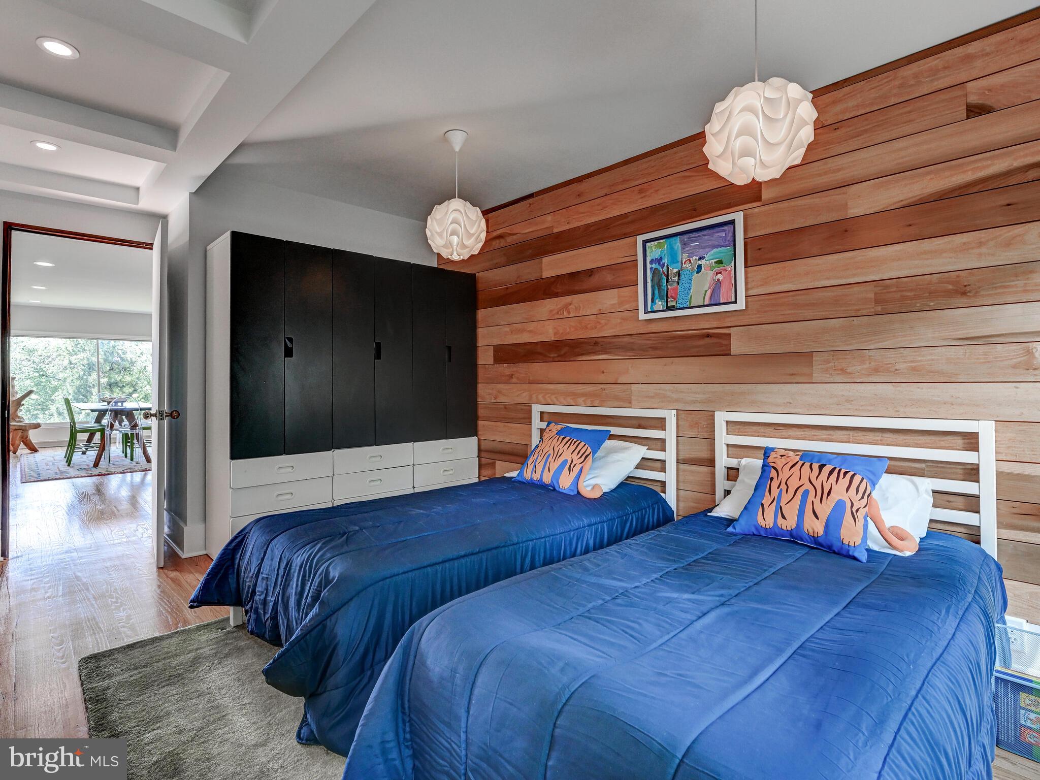 2025 Skyline Road Towson, MD 21204 - Photo 26 of 38 a bedroom with bed and a chandelier