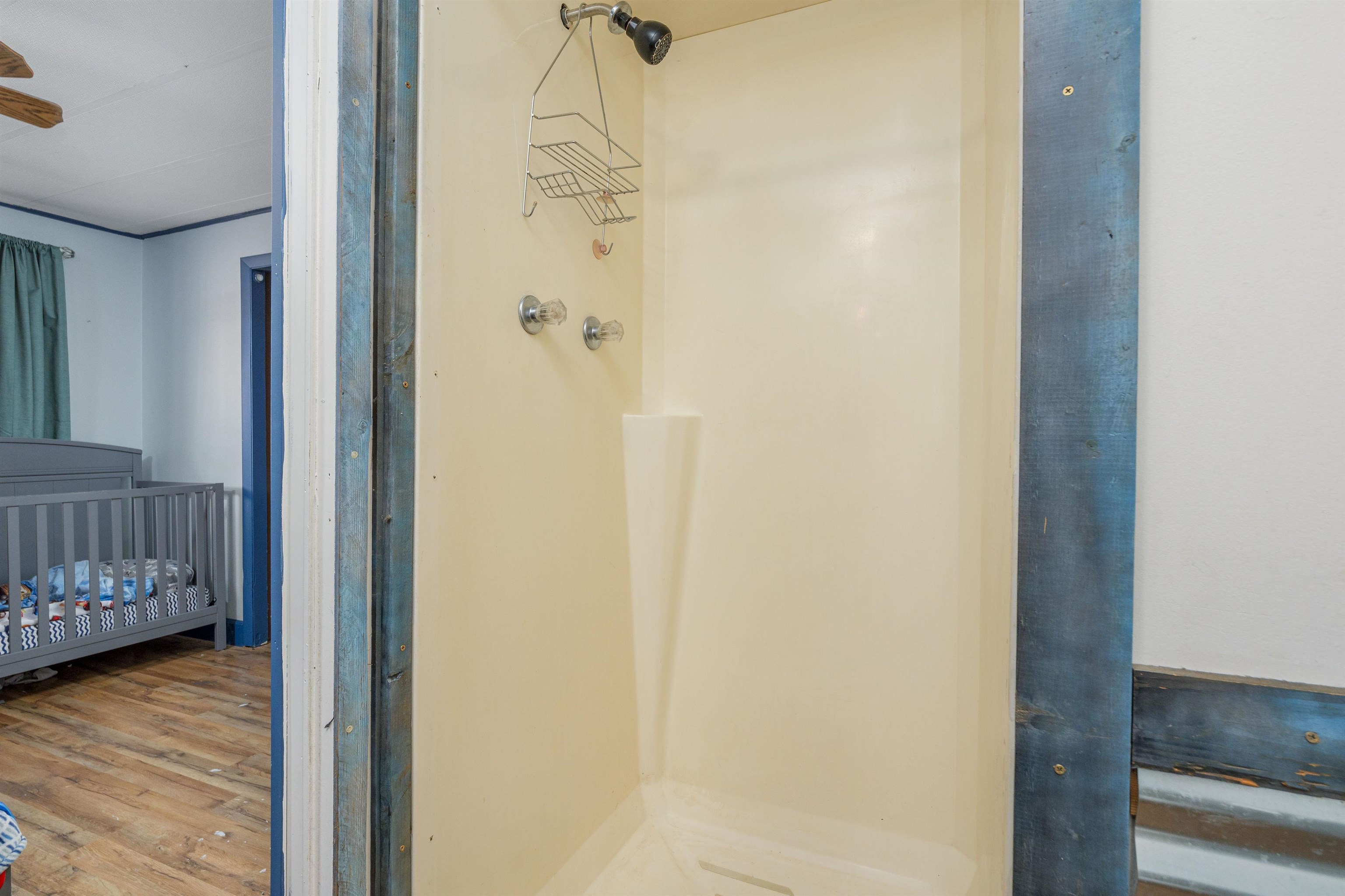 265 Southwest 11th Avenue Cedaredge, CO 81413 - Photo 20 of 39 a view of a room that has a bed in it