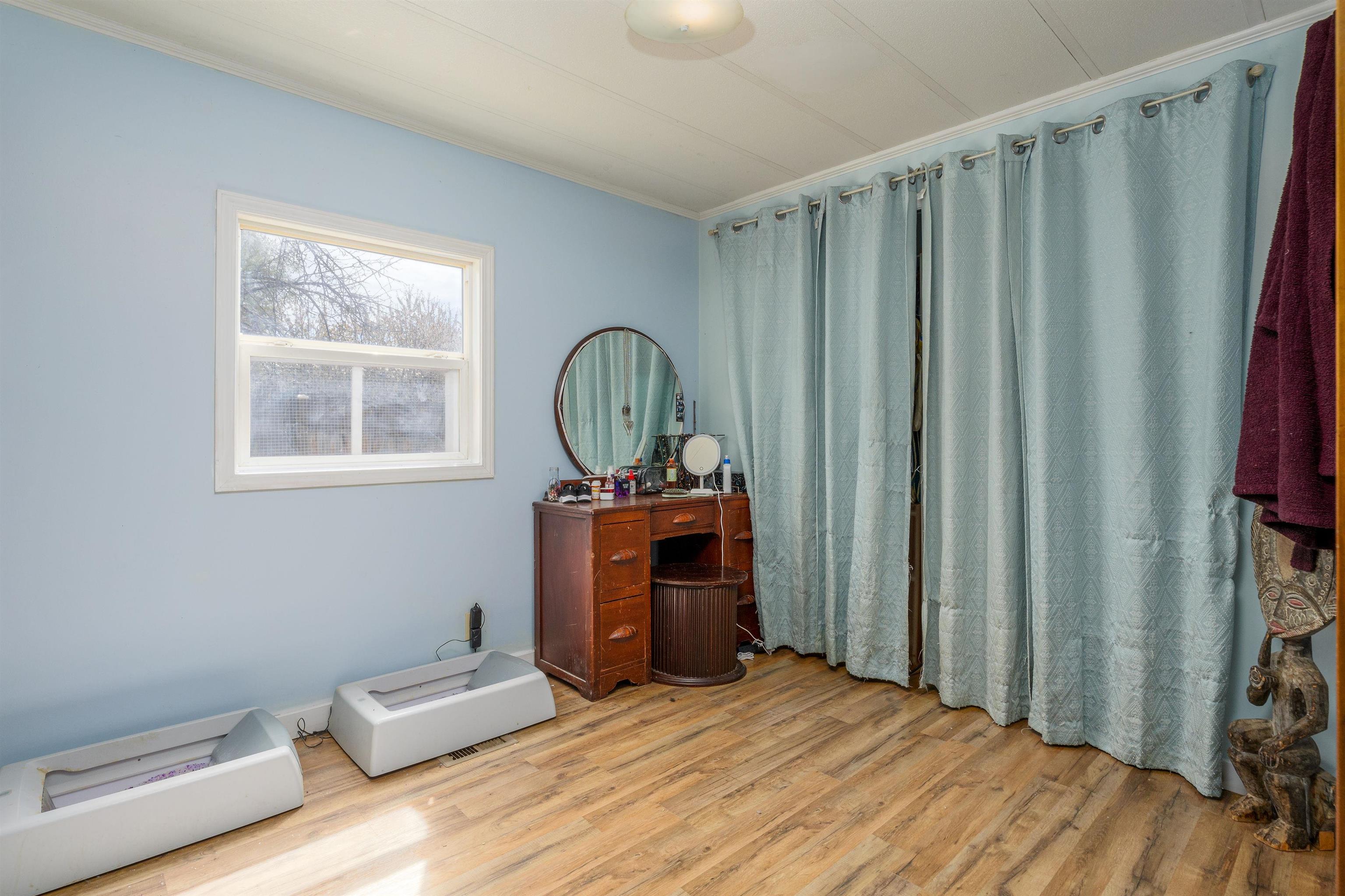 265 Southwest 11th Avenue Cedaredge, CO 81413 - Photo 24 of 39 a room with furniture and a window