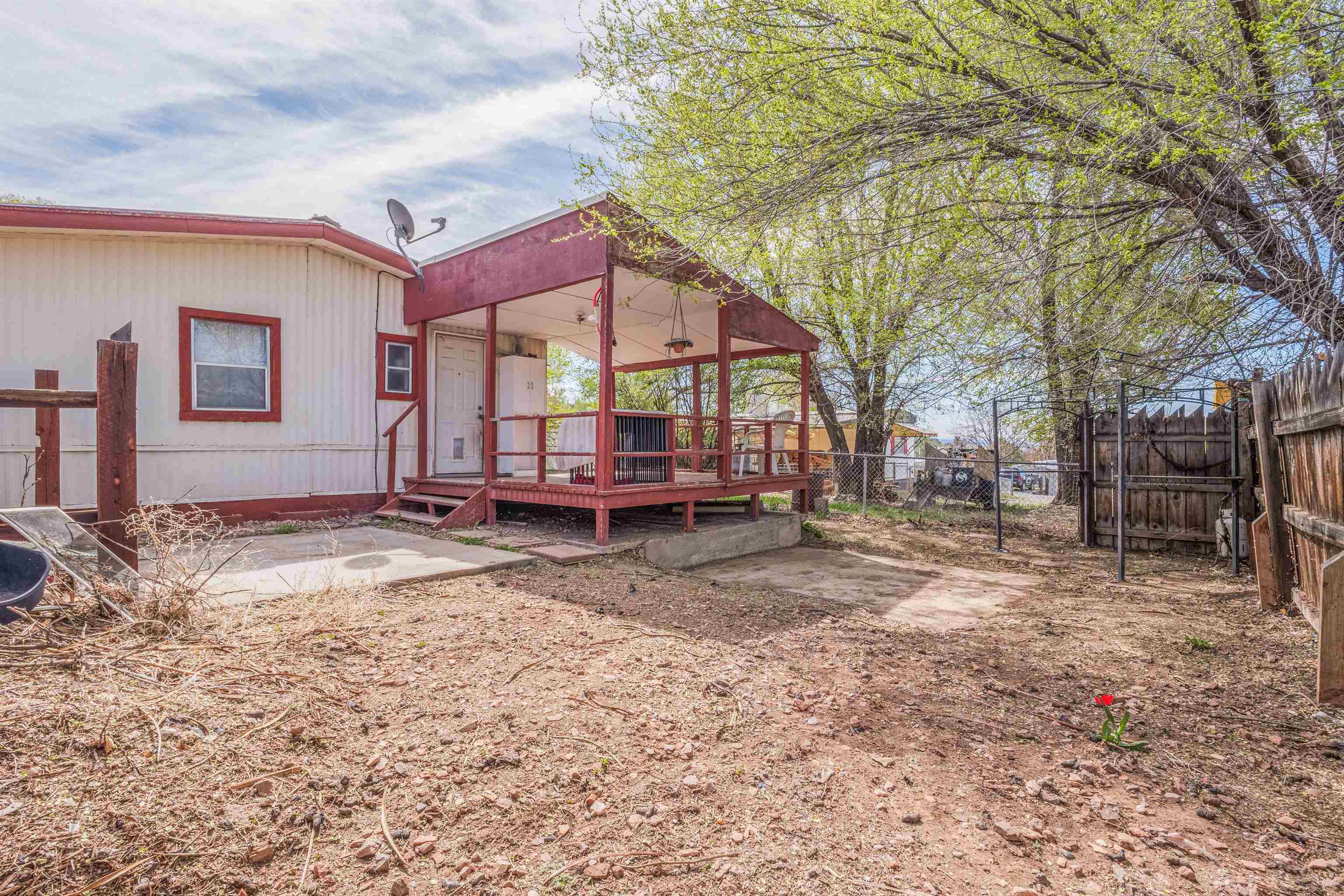 265 Southwest 11th Avenue Cedaredge, CO 81413 - Photo 28 of 39 a house view with a backyard space