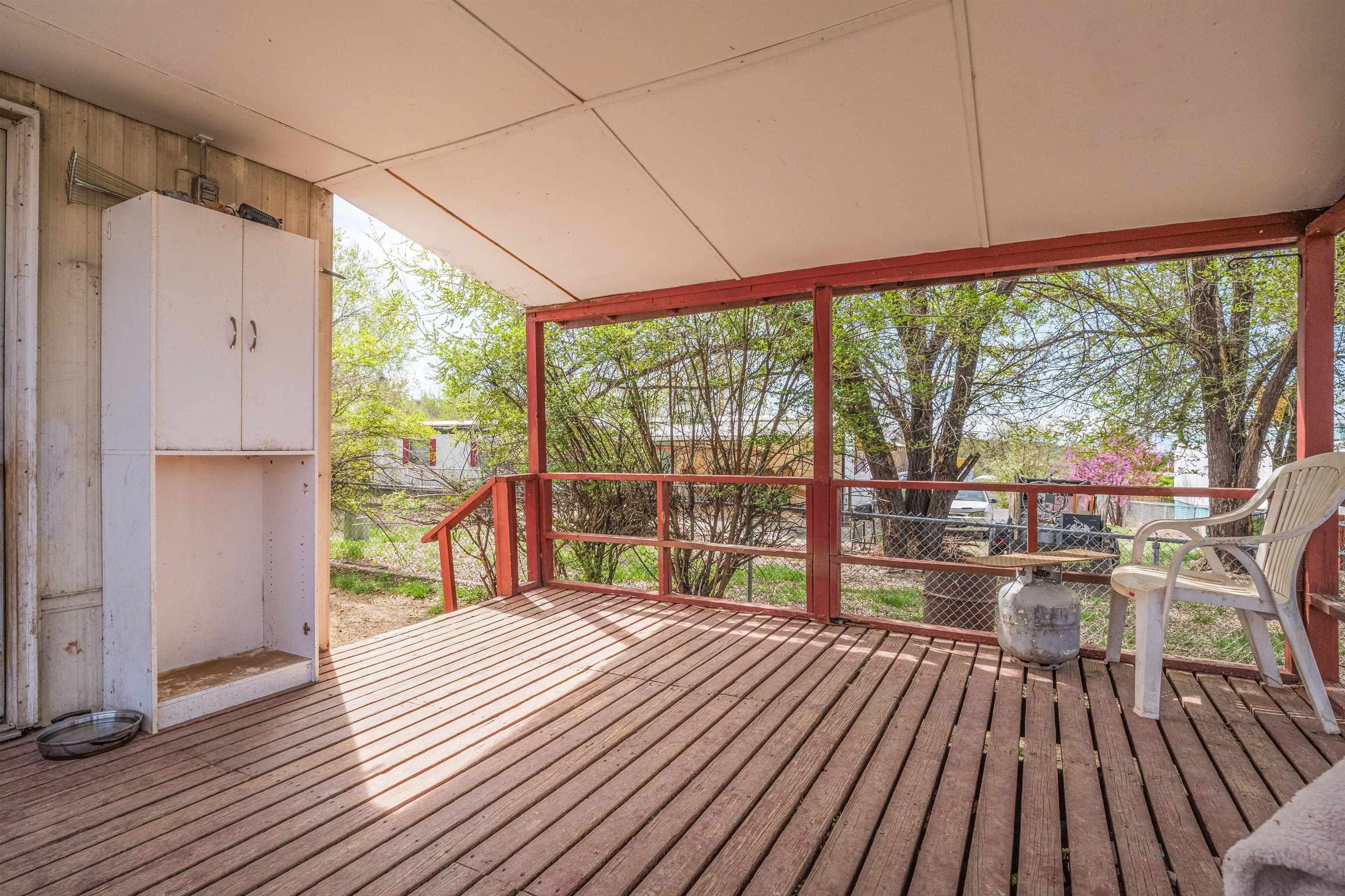 265 Southwest 11th Avenue Cedaredge, CO 81413 - Photo 33 of 39 a room with wooden floor and furniture