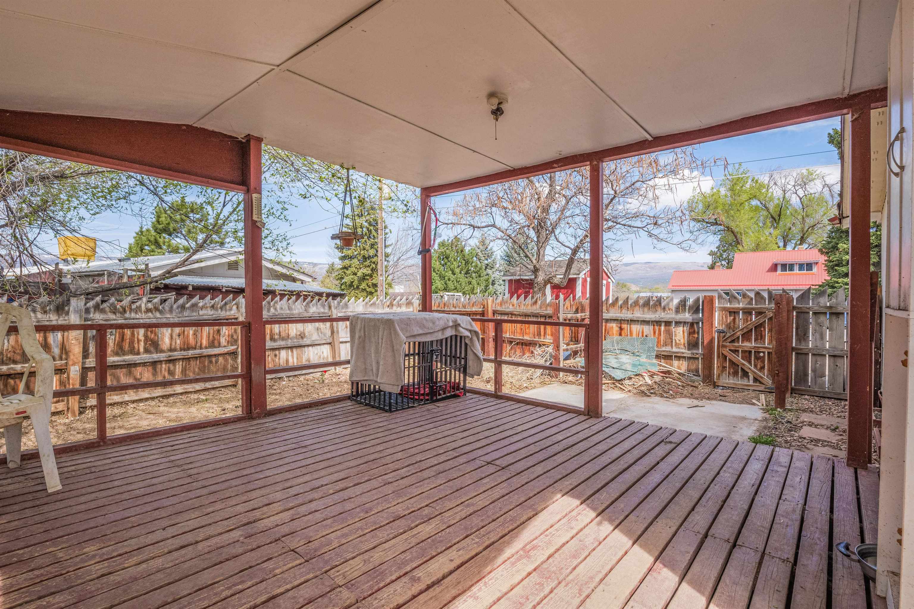 265 Southwest 11th Avenue Cedaredge, CO 81413 - Photo 35 of 39 a view of a balcony with wooden floor