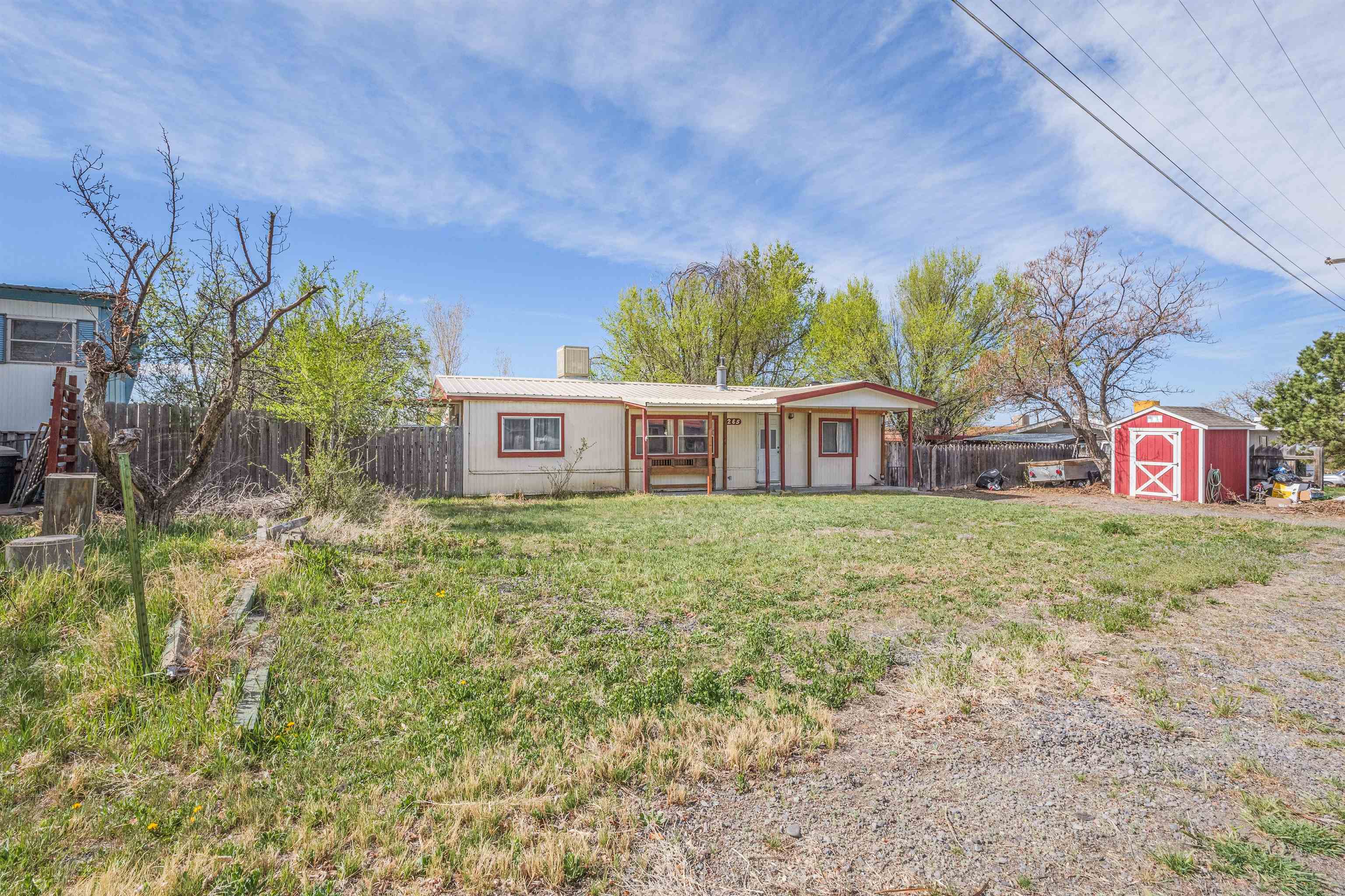 265 Southwest 11th Avenue Cedaredge, CO 81413 - Photo 38 of 39 a front view of a house with garden