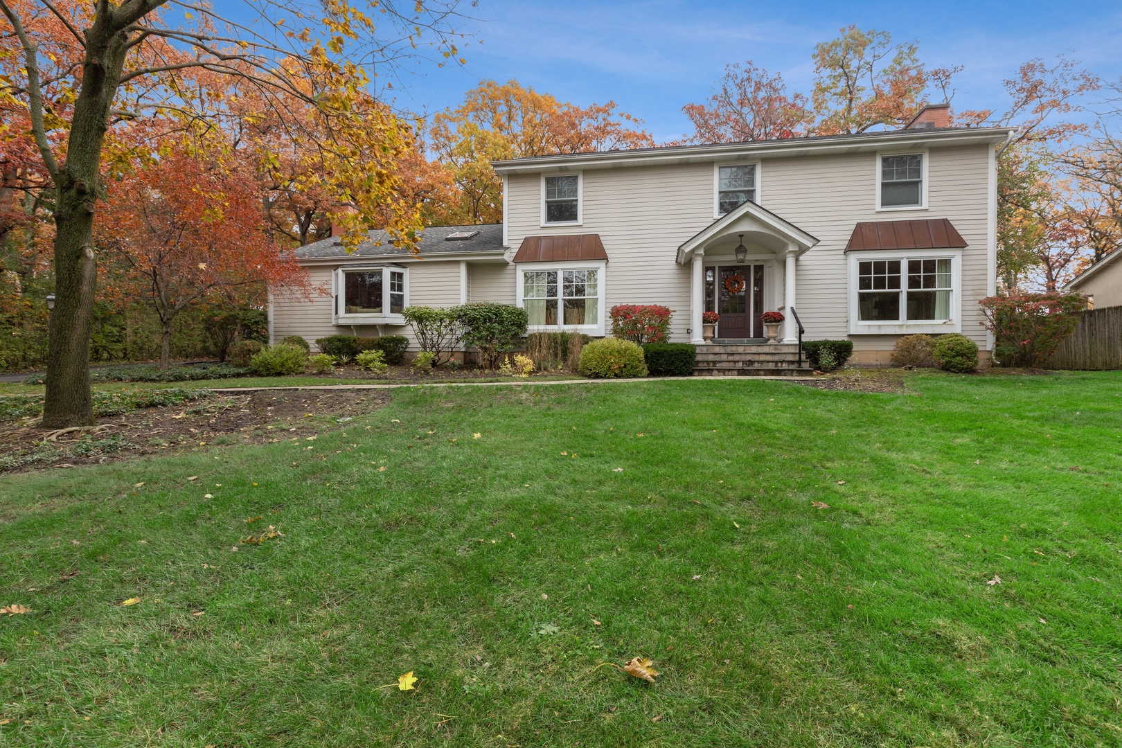 649 Forest Hill Road Lake Forest, IL 60045 - Photo 1 of 23 a view of a house with a yard