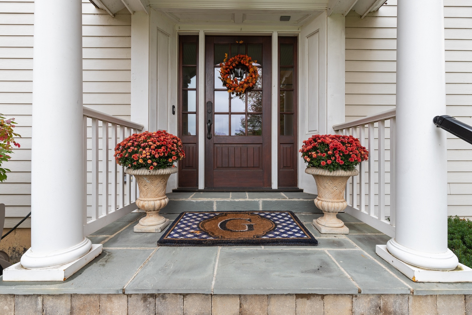 649 Forest Hill Road Lake Forest, IL 60045 - Photo 2 of 23 a room with a fireplace and flowers