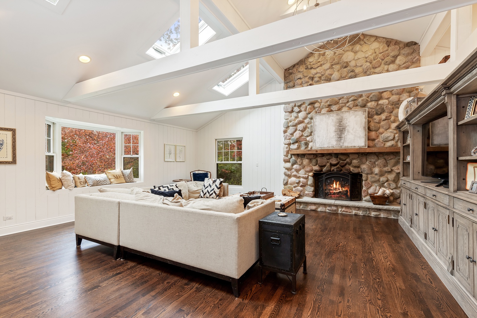 649 Forest Hill Road Lake Forest, IL 60045 - Photo 11 of 23 a living room with furniture a fireplace and a large window
