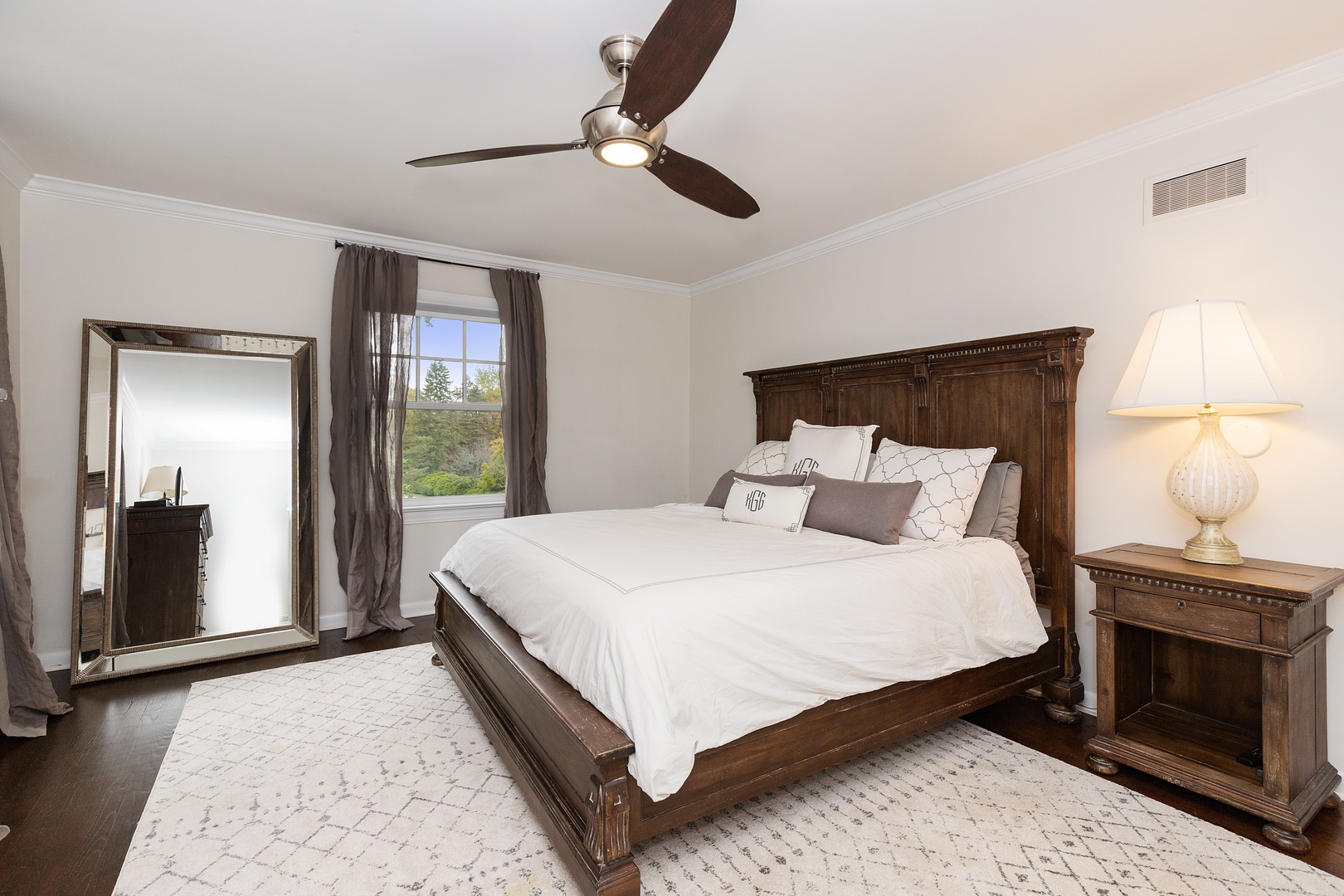 649 Forest Hill Road Lake Forest, IL 60045 - Photo 13 of 23 a bedroom with a bed and a fireplace