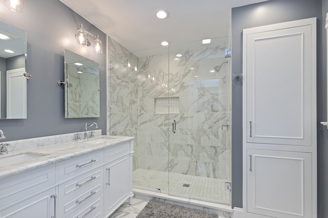 649 Forest Hill Road Lake Forest, IL 60045 - Photo 14 of 23 a bathroom with a shower sink vanity granite and a mirror