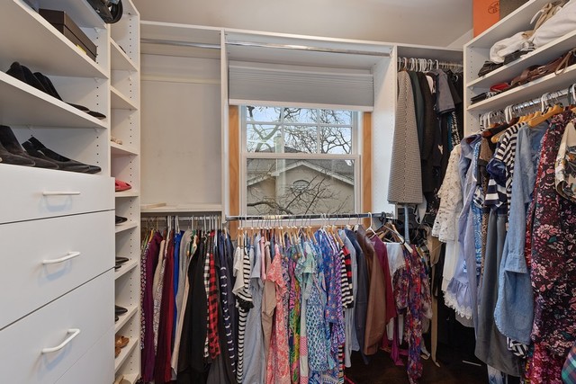 649 Forest Hill Road Lake Forest, IL 60045 - Photo 15 of 23 a view of walk in closet with clothes and shoes