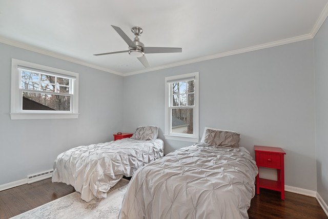649 Forest Hill Road Lake Forest, IL 60045 - Photo 18 of 23 a bedroom with two beds and a window