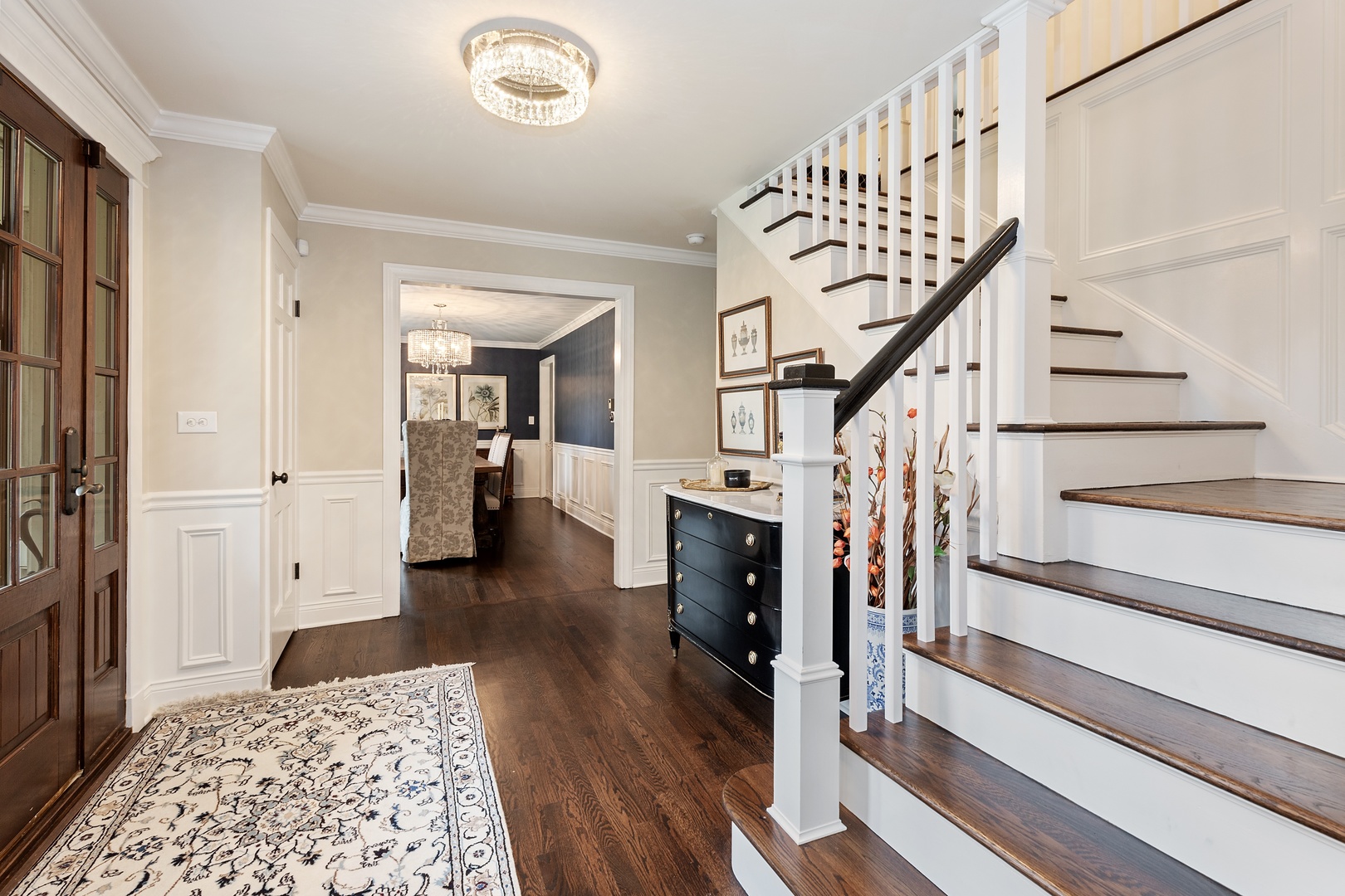 649 Forest Hill Road Lake Forest, IL 60045 - Photo 3 of 23 a view of entryway and hall with wooden floor